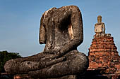 Ayutthaya, Thailand. Wat Chaiwatthanaram, headless Buddha statue of the gallery. 